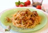 Spaghetti con spezzatino e piselli 